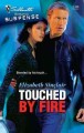 Touched by fire Cover Image